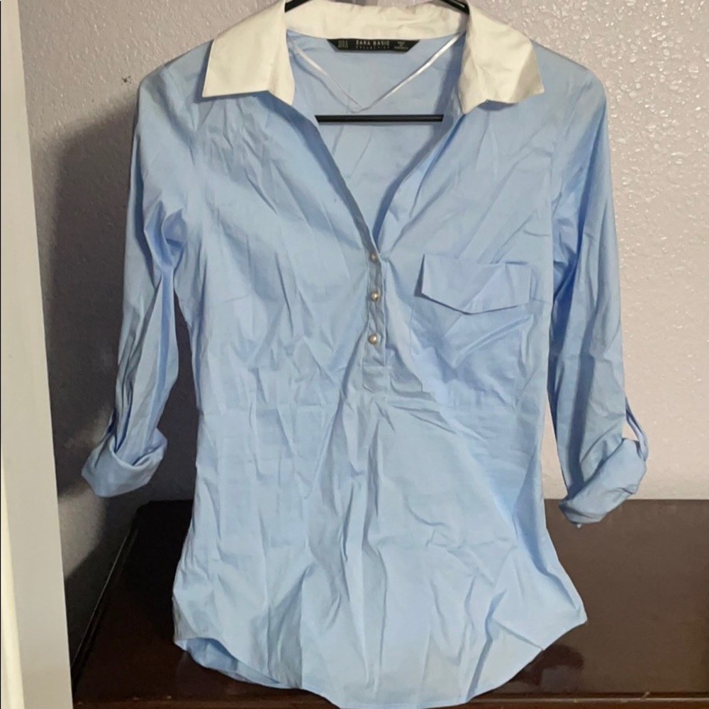 Blue shirt with white color